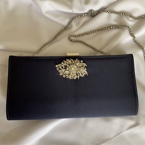 Navy blue clutch handbag. Like new.